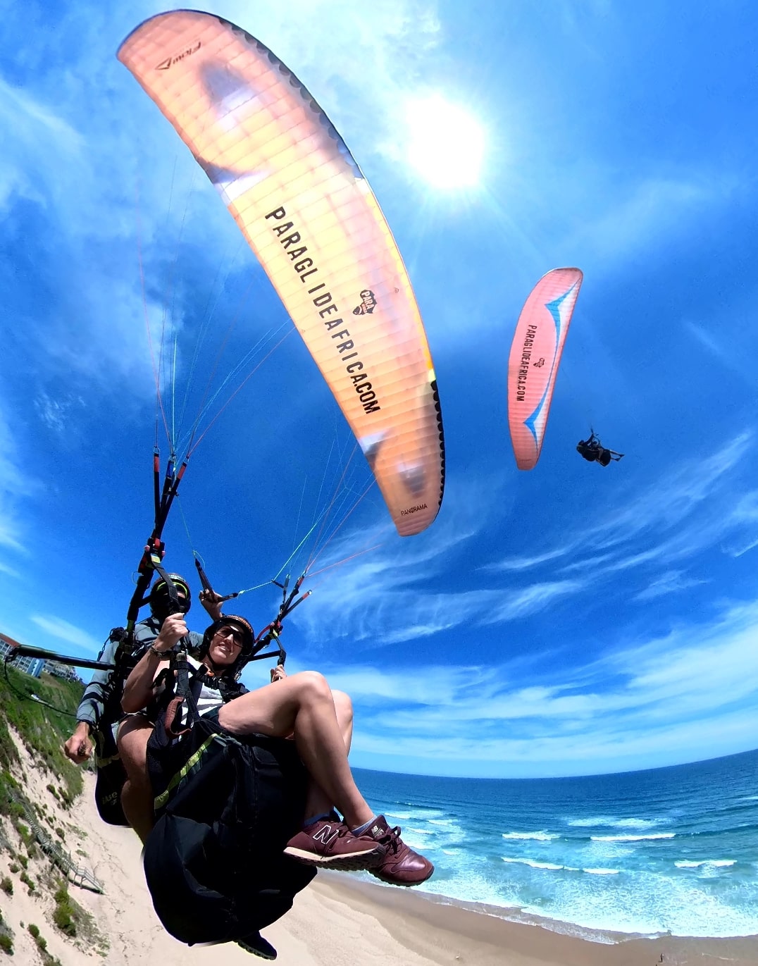 Tandem paragliding over the beach in the Garden Route with Paraglide Africa