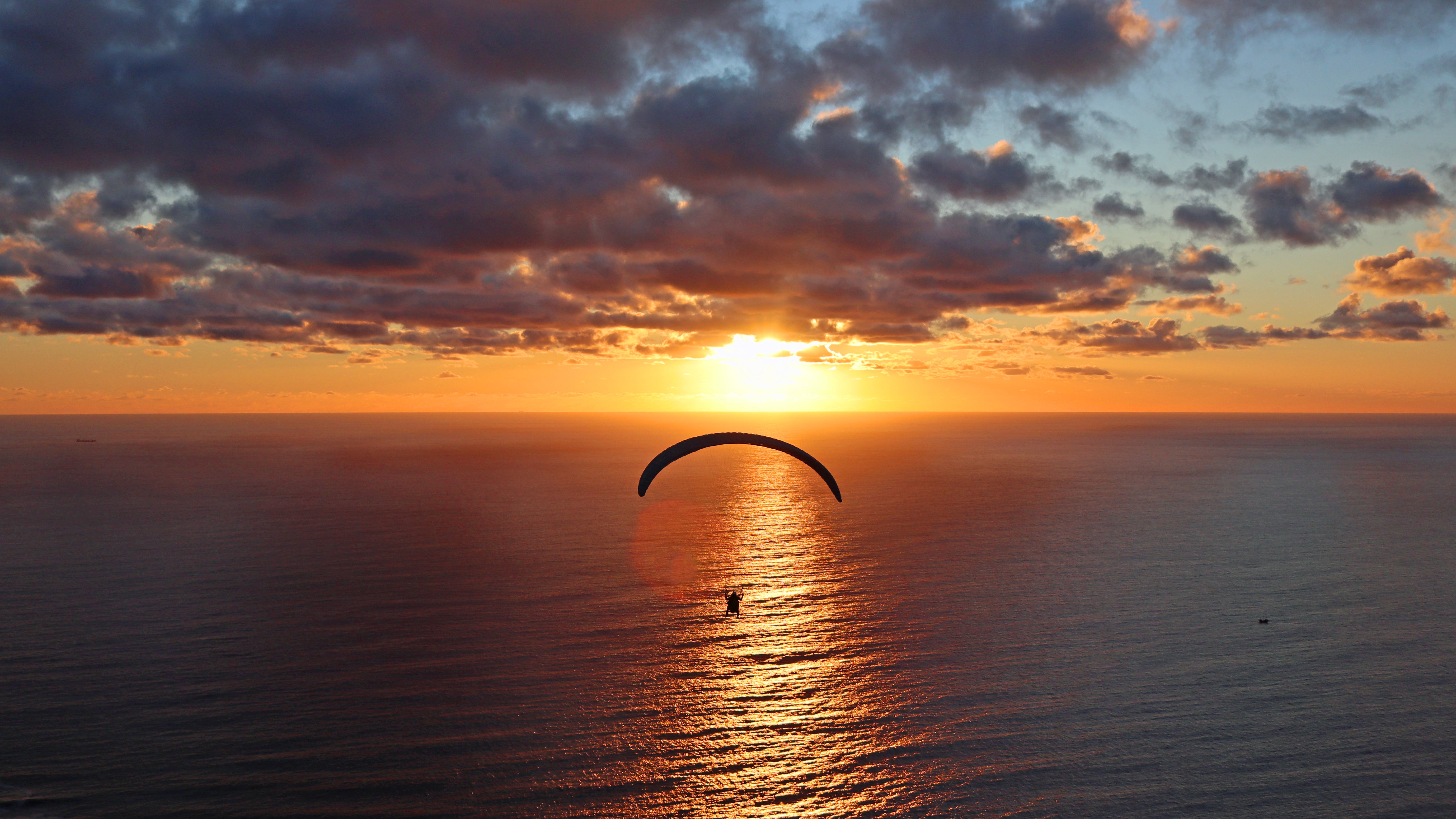 Instructor Theunis Capturing Magic Aerial Moments .ParaglideAfrica Cape Town Tandem Paragliding: Sunset Over Camps Bay
